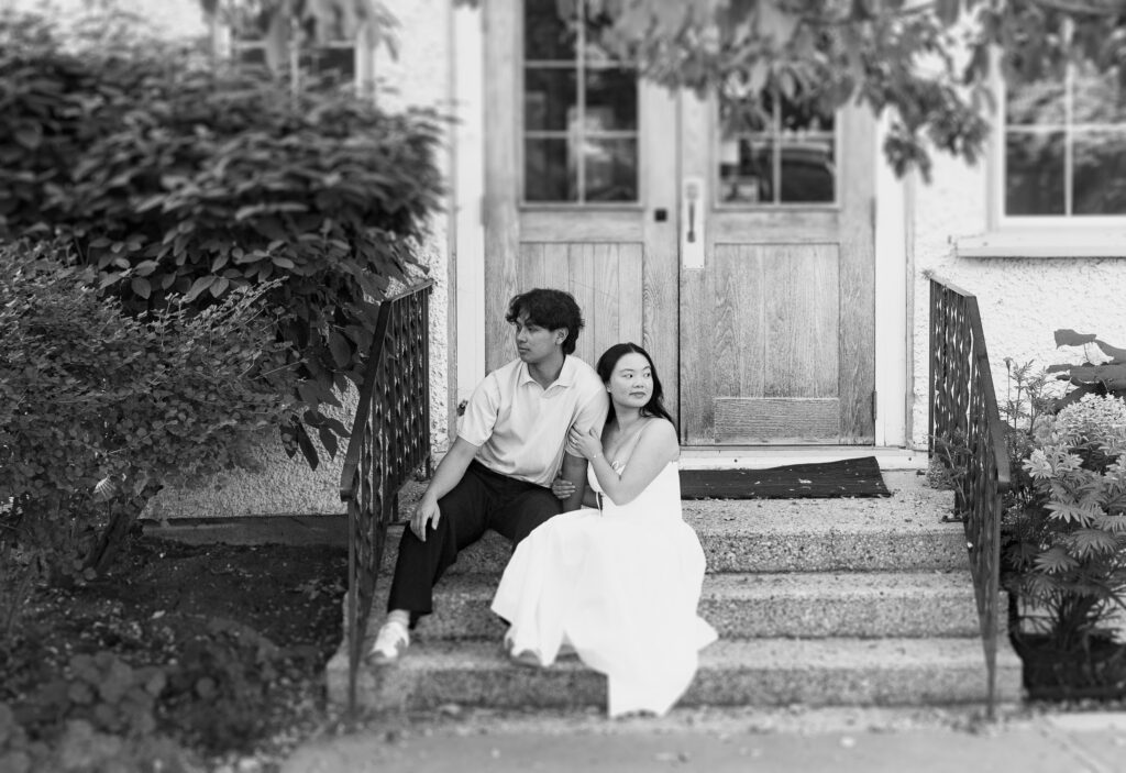 Edmonton engagement photography of a couple sitting on the steps of church in Wihkwentowin