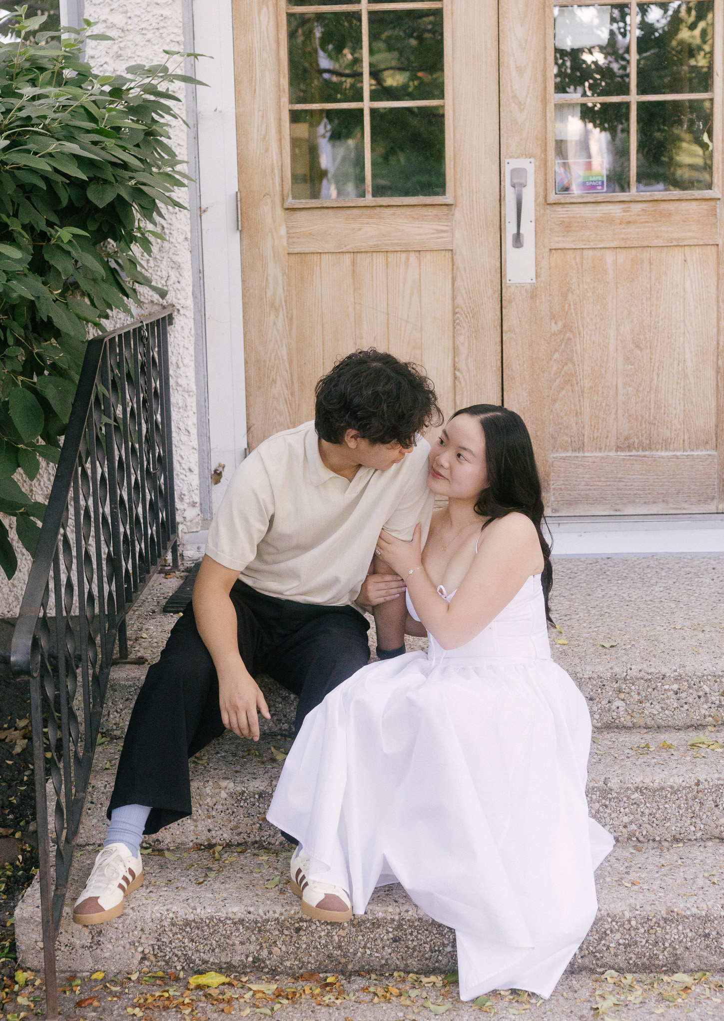 Engaged couple embracing during an Edmonton engagement session in Wihkwentowin